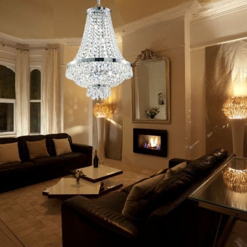 Lustre Caesar de la marque Ideal Lux en couleur chrome dans un salon en soirée